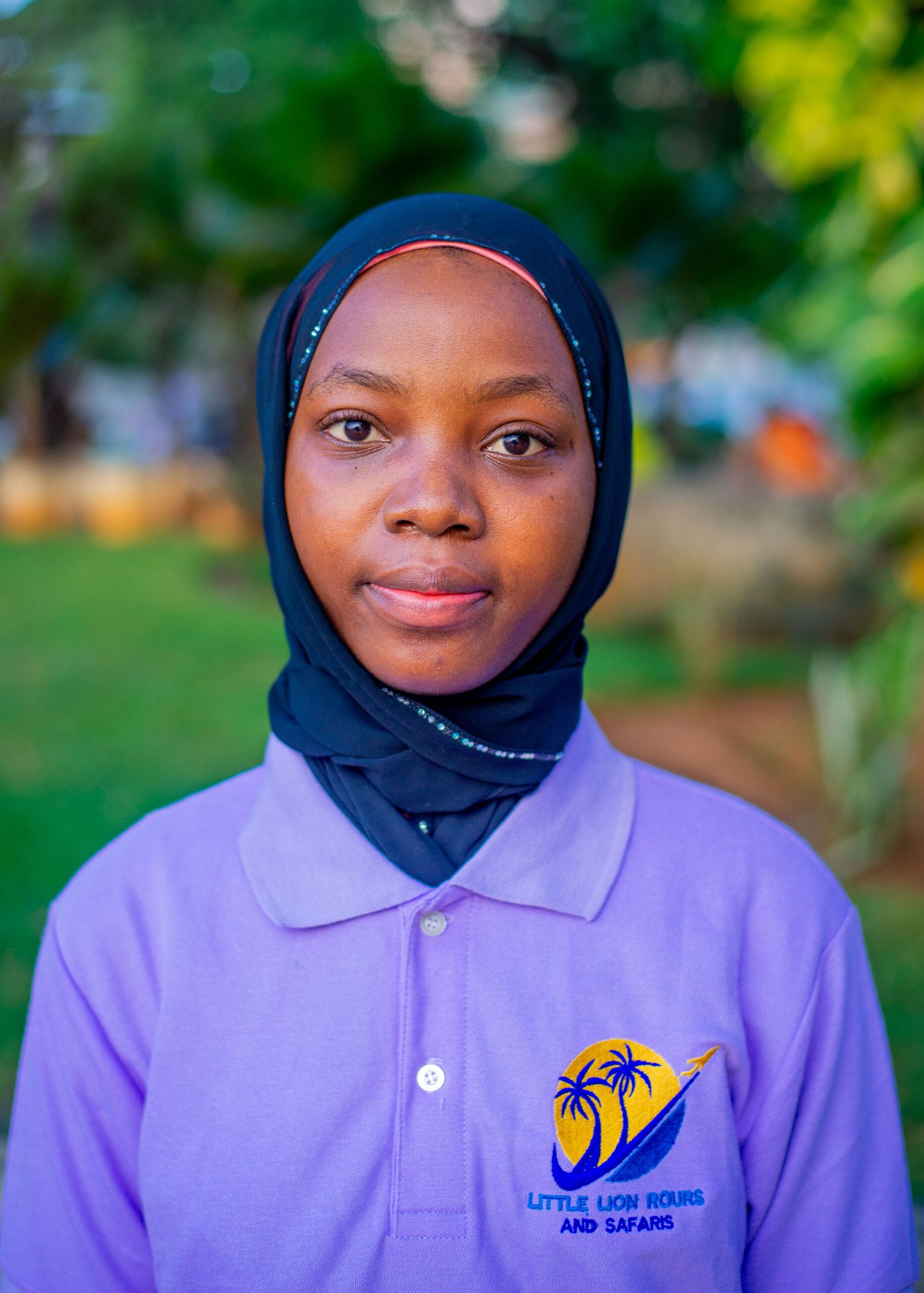 Air Ticketing Officer at Little Lion Tours & Safaris assisting clients with domestic and international flight bookings in Tanzania.